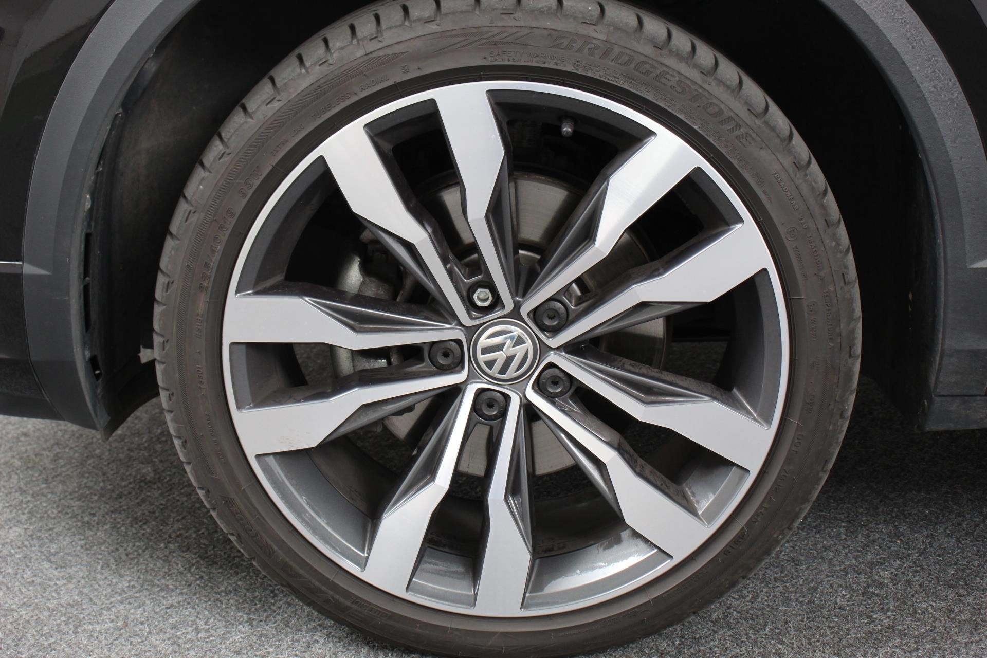 Volkswagen T-Roc 1.5 TSI 150pk DSG R-Line United Navigatie C, Auto's, Volkswagen, Stof, 4 cilinders, 150 pk, Zwart