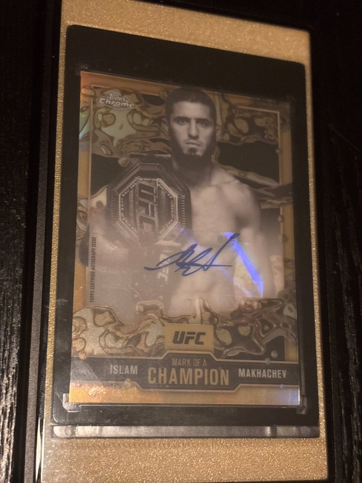 Islam Makhachev Auto /50 Marks of a Champion UFC topps Kaart, Ophalen of Verzenden, Zo goed als nieuw, Losse kaart, Foil