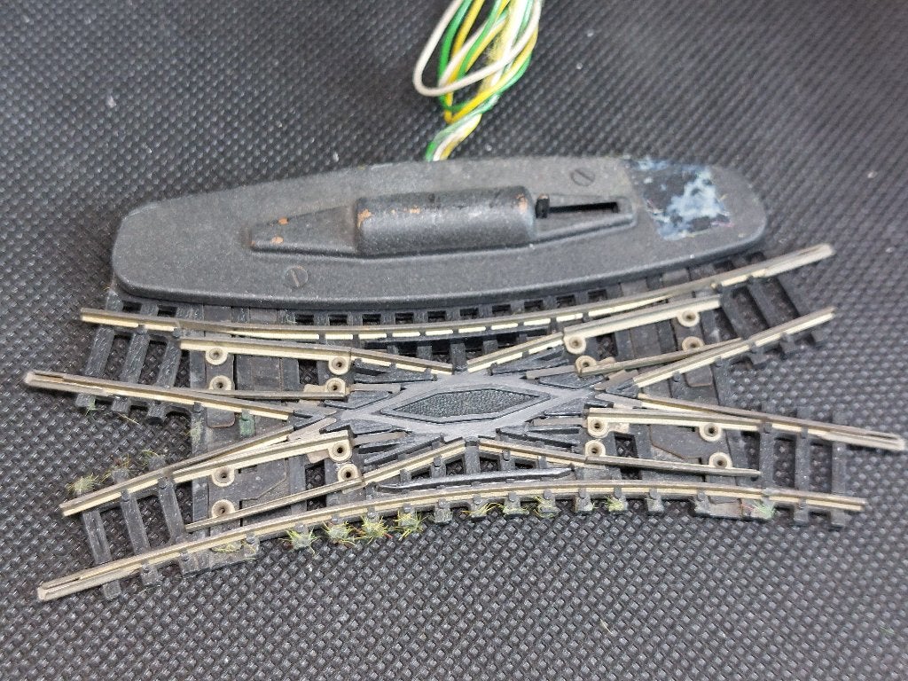 Minitrix 4968 - Kruiswissel elektr. 104,2mm. 30 gr. (14667), Gebruikt, Gelijkstroom, Trix, Rails