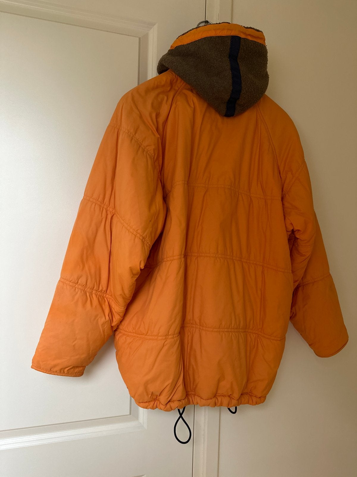 Oranje gewatteerde ski/winterjas met capuchon, maat L, Ophalen of Verzenden, Gedragen, Maat 38/40 (M), Oranje