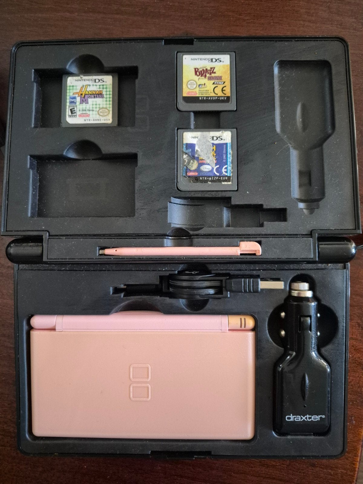 Roze Nintendo DS Lite met games en accessoires, Gebruikt, Ophalen of Verzenden, Roze, Met beschermhoes of tas