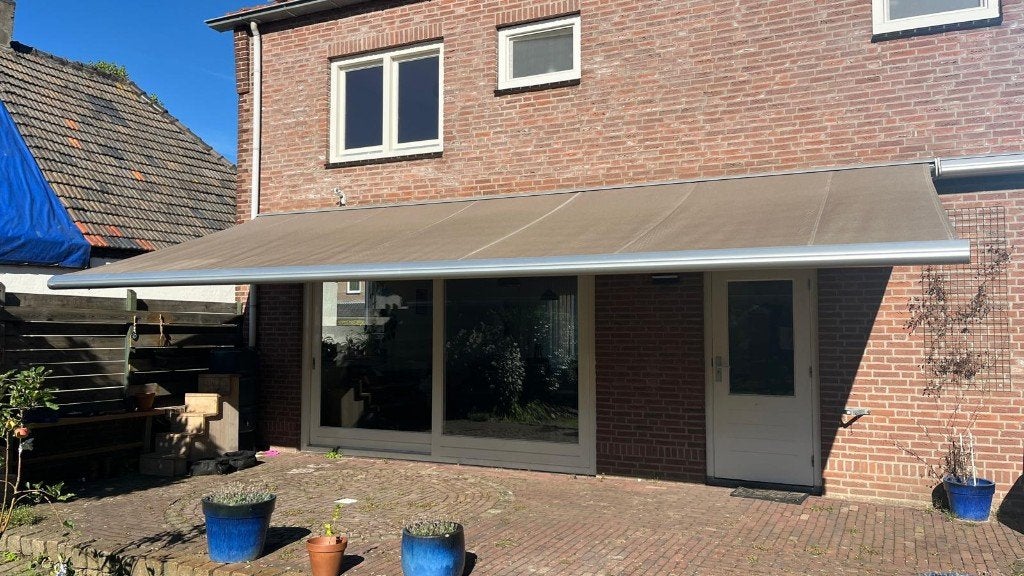 Zonwering 7,5 meter. Prachtige luifel voor breed terras., Ophalen, 450 cm of meer, Elektrisch, Zo goed als nieuw