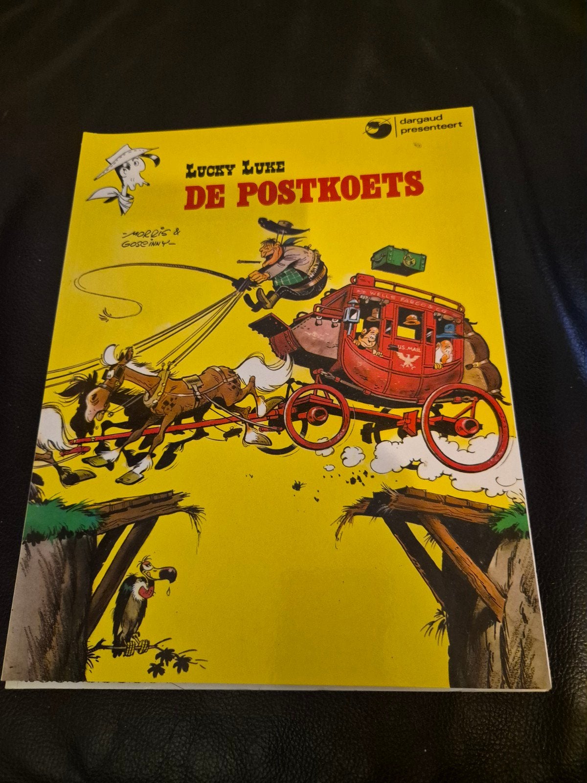 Lucky Luke - De Postkoets (Morris & Goscinny), Eén stripboek, Ophalen of Verzenden, Gelezen, Morris & Goscinny