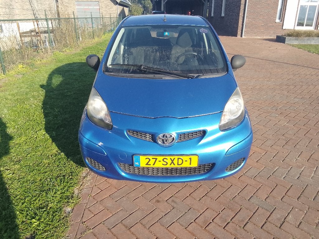 Toyota Aygo 1.0 12V Vvt-i 5DRS 2012 Blauw, Auto's, Voorwielaandrijving, Stof, 68 pk, Origineel Nederlands