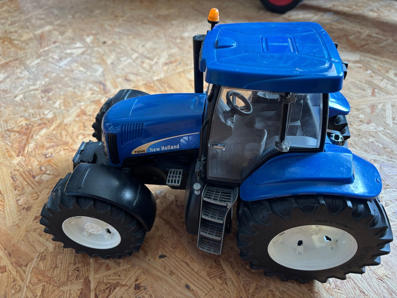 Bruder New Holland T8040 tractor - Speelgoedtractor, Ophalen of Verzenden, Gebruikt