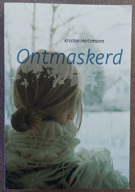 Kristen Heitzmann: Ontmaskerd, Ophalen of Verzenden, Zo goed als nieuw