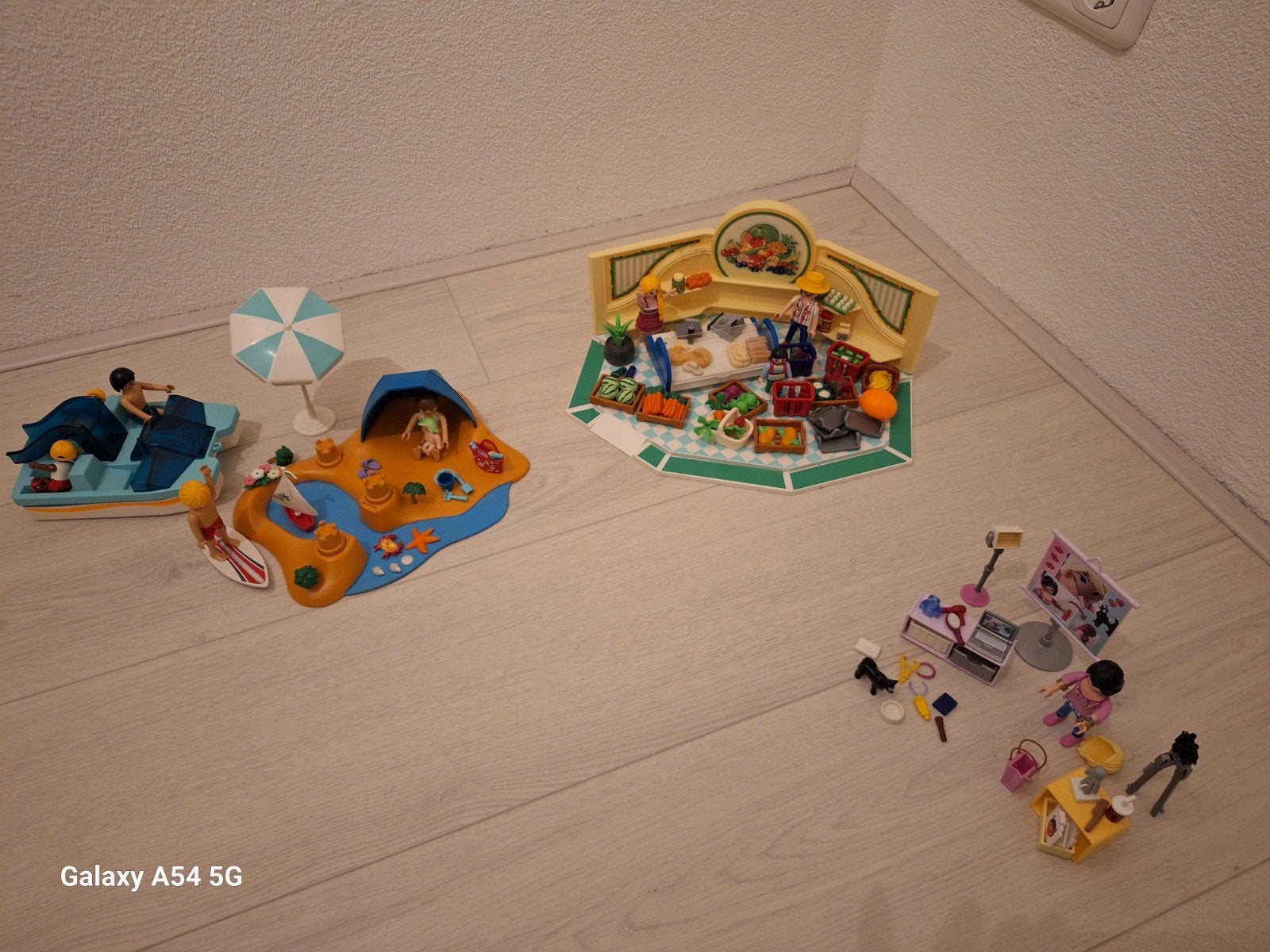 Playmobil sets: Strand, Supermarkt en Vlogstudio