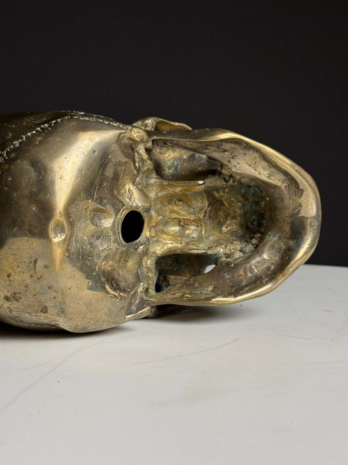Bronzen schedel memento mori 20e eeuw, Ophalen
