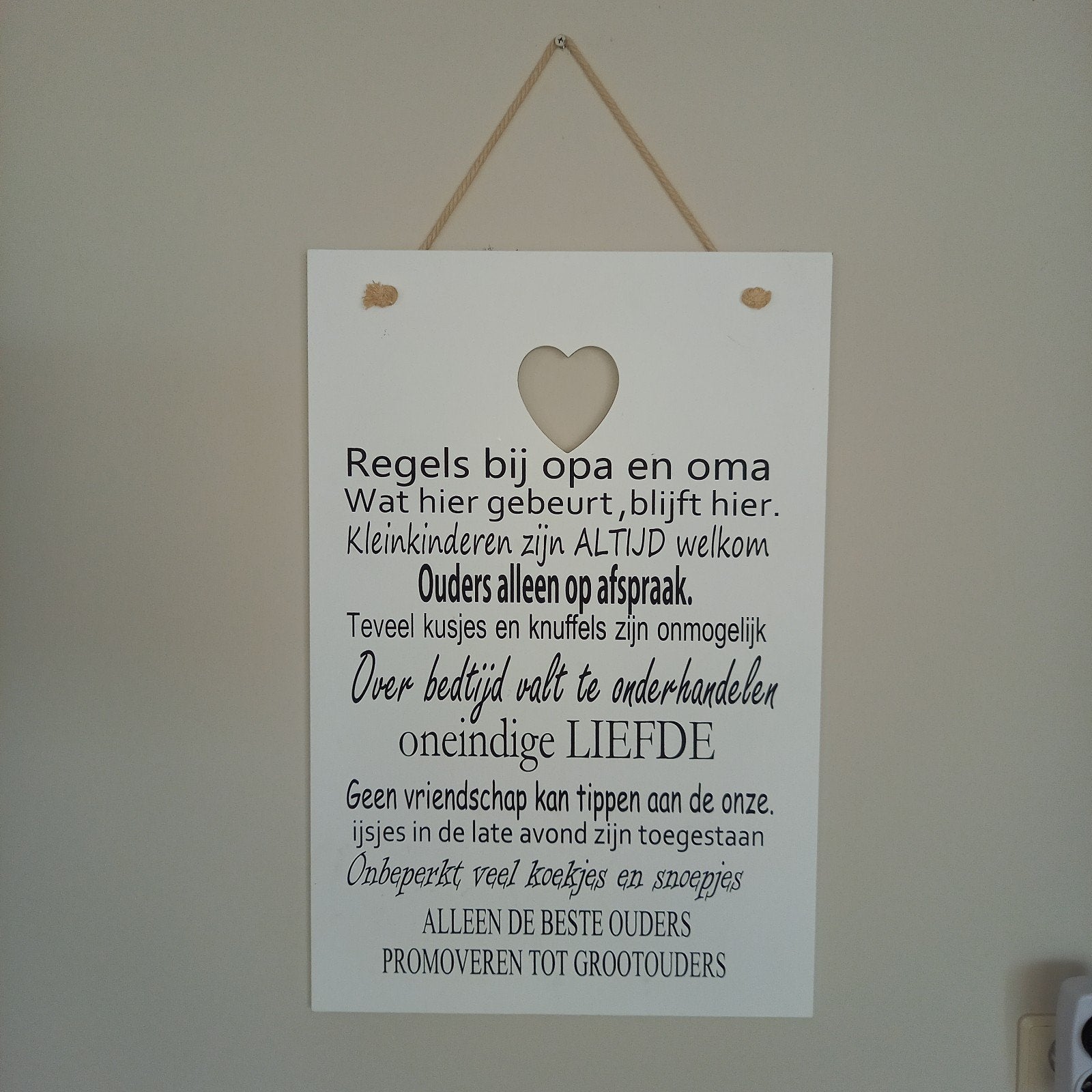 Tekstbord  bij opa en oma, Ophalen