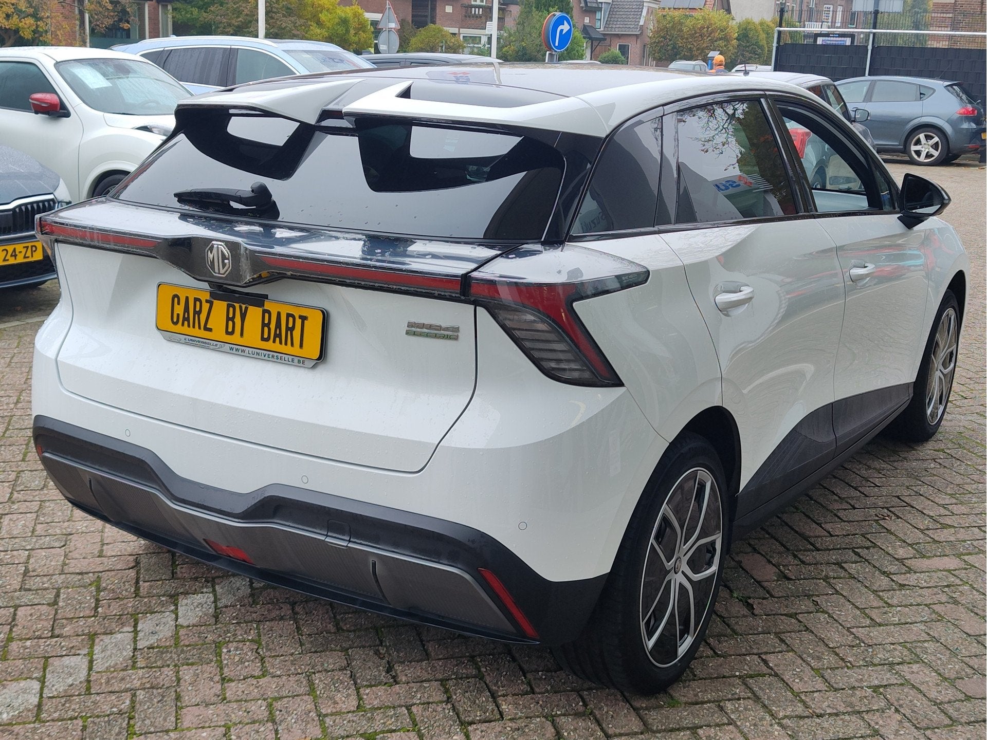 MG Mg4 electric TROPHY EXTENDED RANGE 77 kWh 360 Camera | Wa, Auto's, Automaat, Achterwielaandrijving, Zwart, Leder en Stof