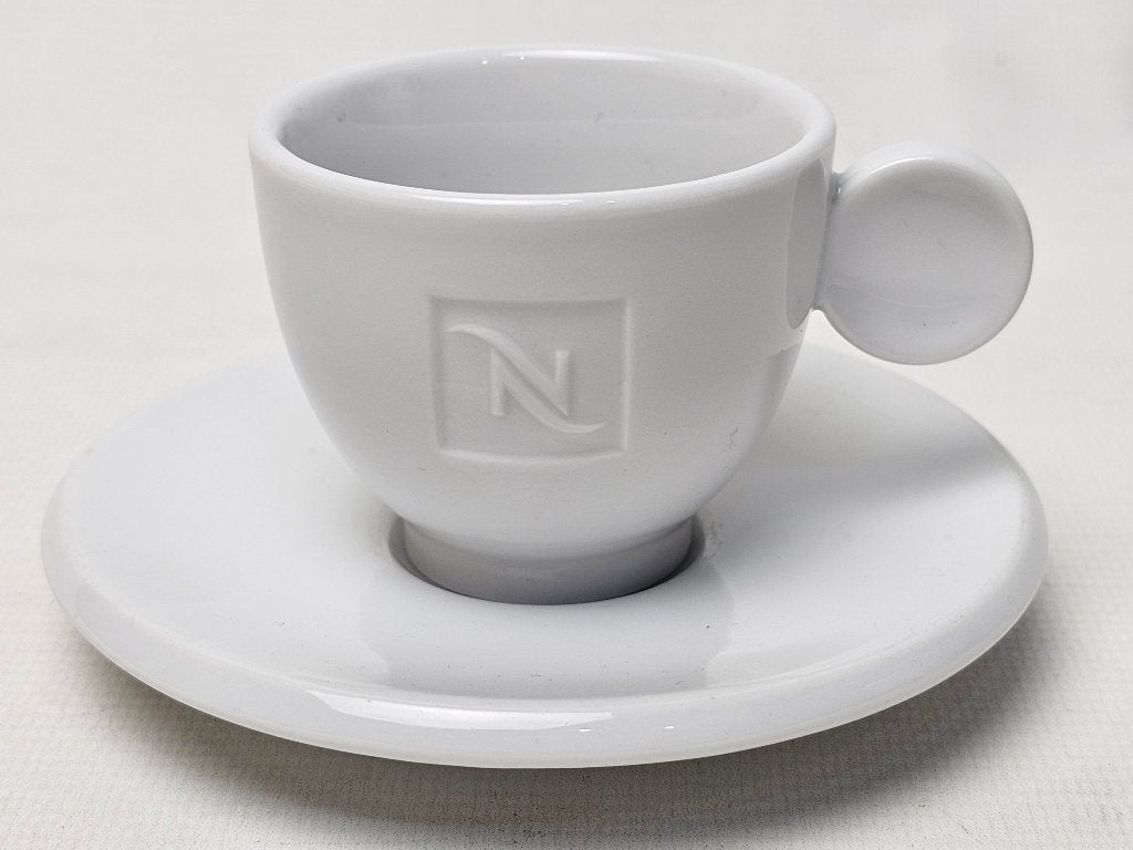 # Nespresso espresso kop en schotels, Gebruikt, Ophalen of Verzenden, Overige stijlen, Kop(pen) en/of Schotel(s)