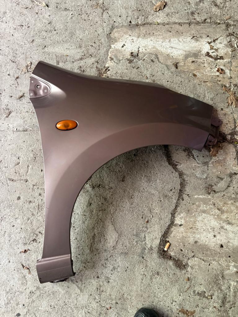 Spatbord Rechts Voor Suzuki Alto / Nissan Pixo 2009-2014, Ophalen of Verzenden