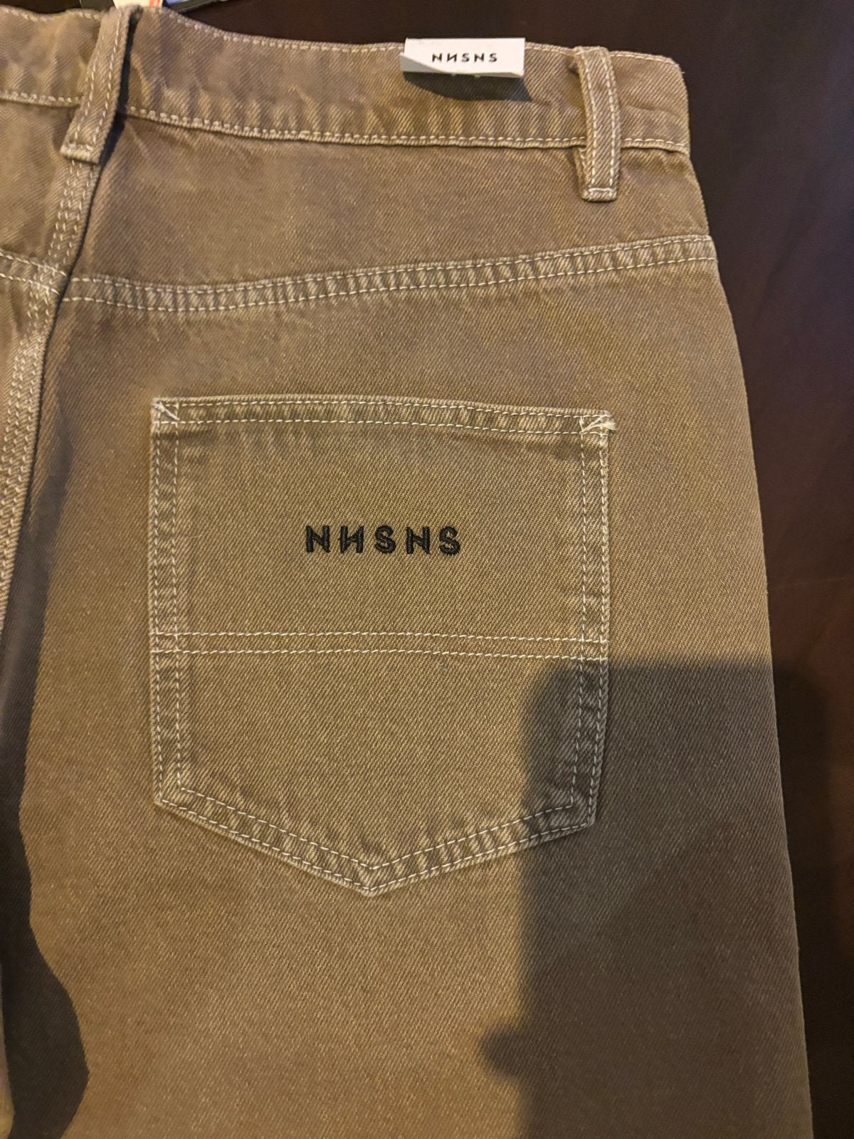 NNSNS 'Bigfoot' jeans - Nieuw met kaartjes, Ophalen of Verzenden, Nieuw, Maat 48/50 (M), Bruin