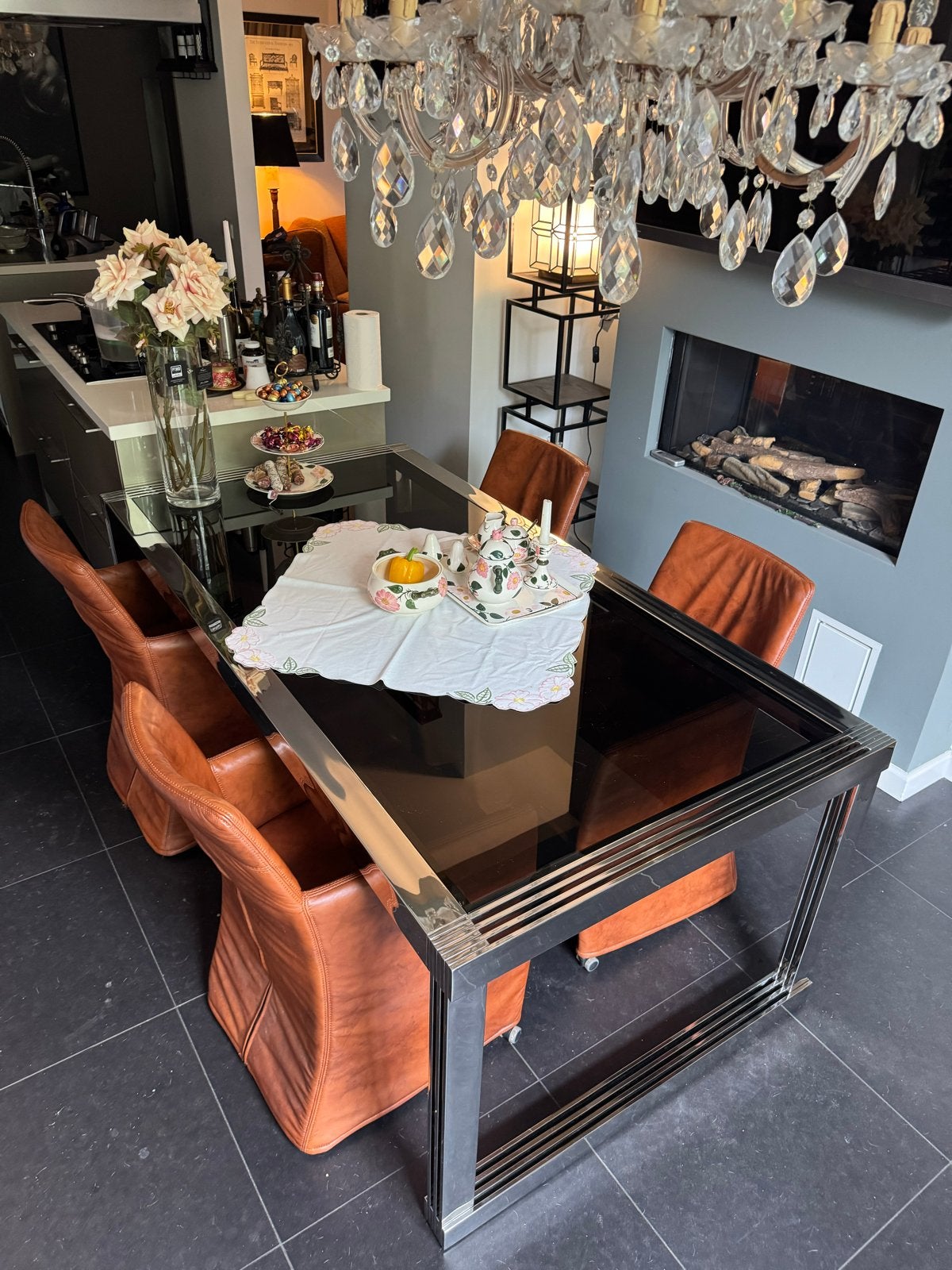 Eichholtz Eettafel - Gepolijst RVS met Donker Glazen Blad, Ophalen, Gebruikt, 100 tot 150 cm, Luxueus