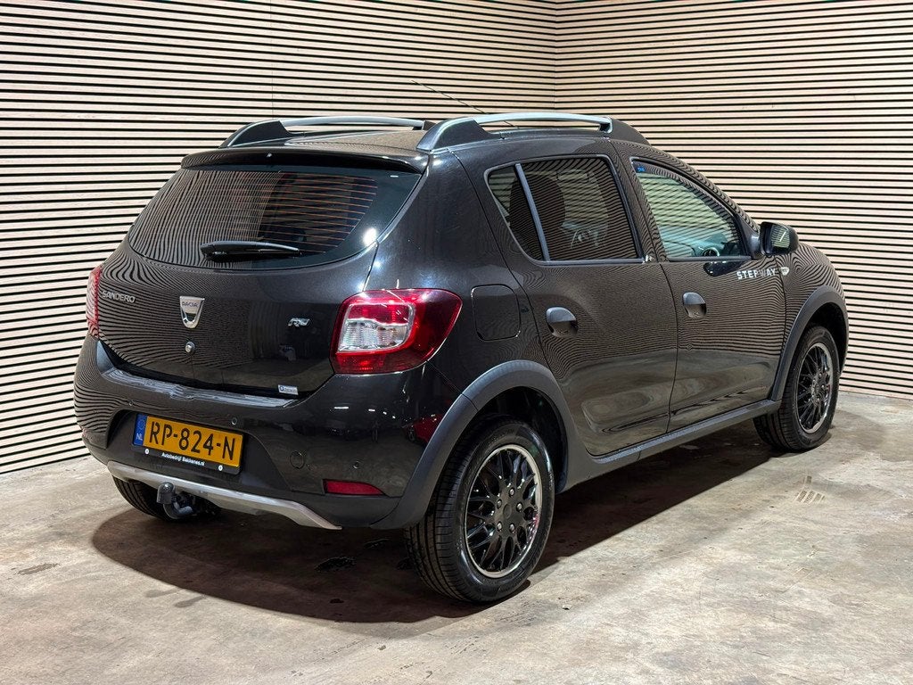 Dacia Sandero 0.9 TCe Stepway | Airco | Cruise | Bluetooth |, Auto's, Dacia, Gebruikt, Met garantie (alle), Zwart, Leder