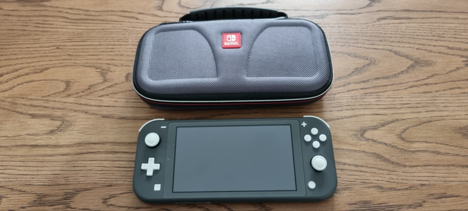 Nintendo Switch Lite Grijs met beschermhoes, Spelcomputers en Games, Spelcomputers | Nintendo Switch Lite, Zo goed als nieuw, Grijs