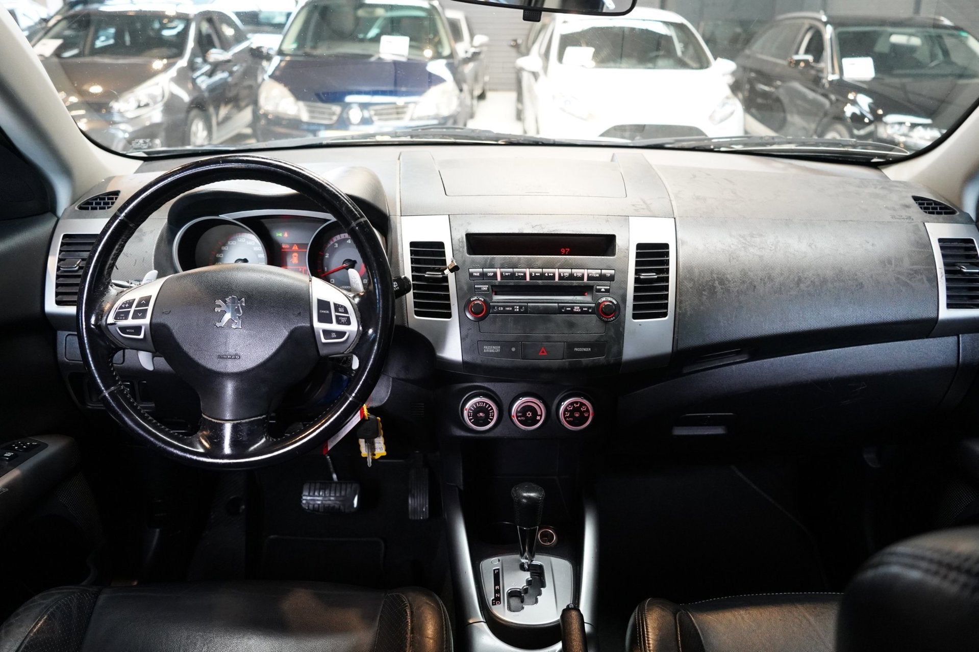 Peugeot 4007 2.4 GT 7p. |AUTOMAAT| AIRCO | CRUISE | PDC | EL, Auto's, Automaat, Gebruikt, 4 cilinders, 7 stoelen