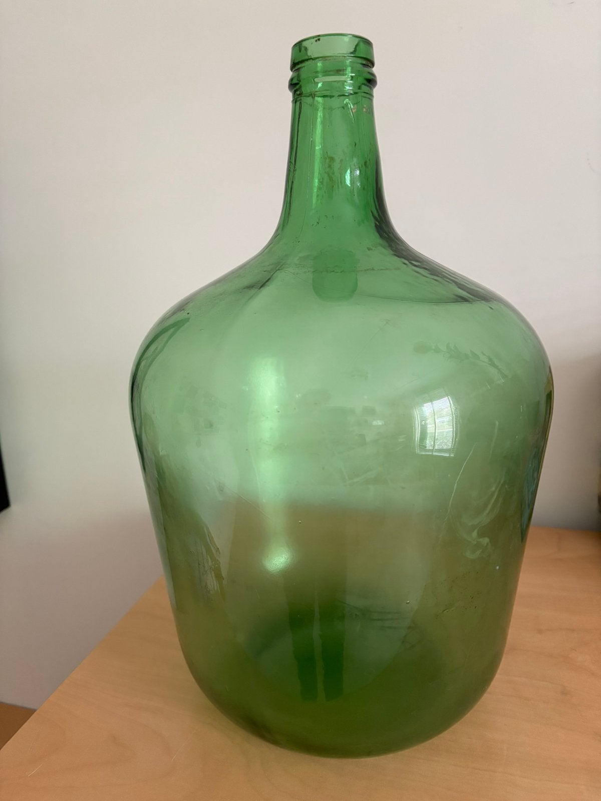 Grote groene glazen fles, Ophalen, Gebruikt