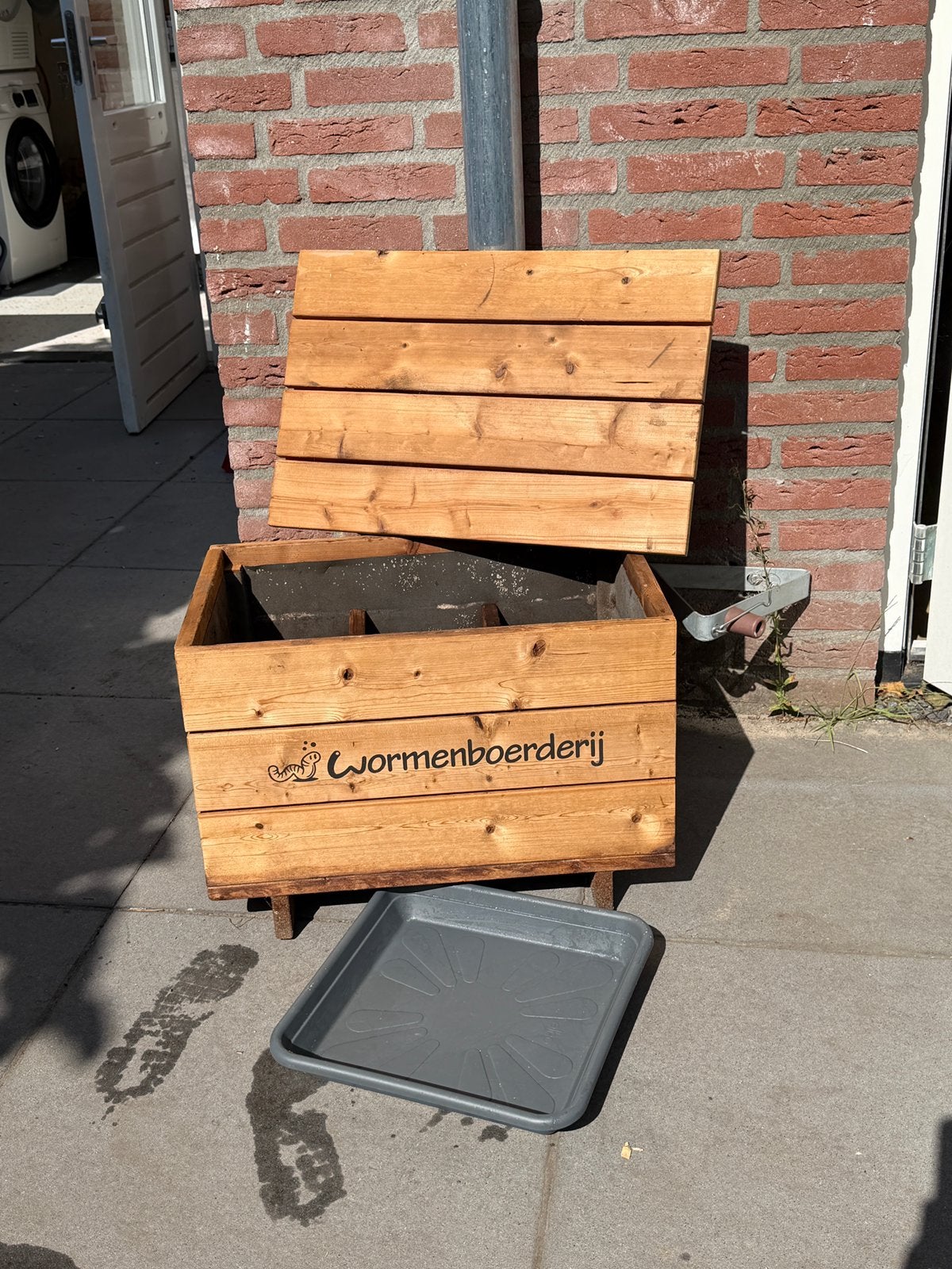 Houten wormenboerderij, Ophalen, Compostbak