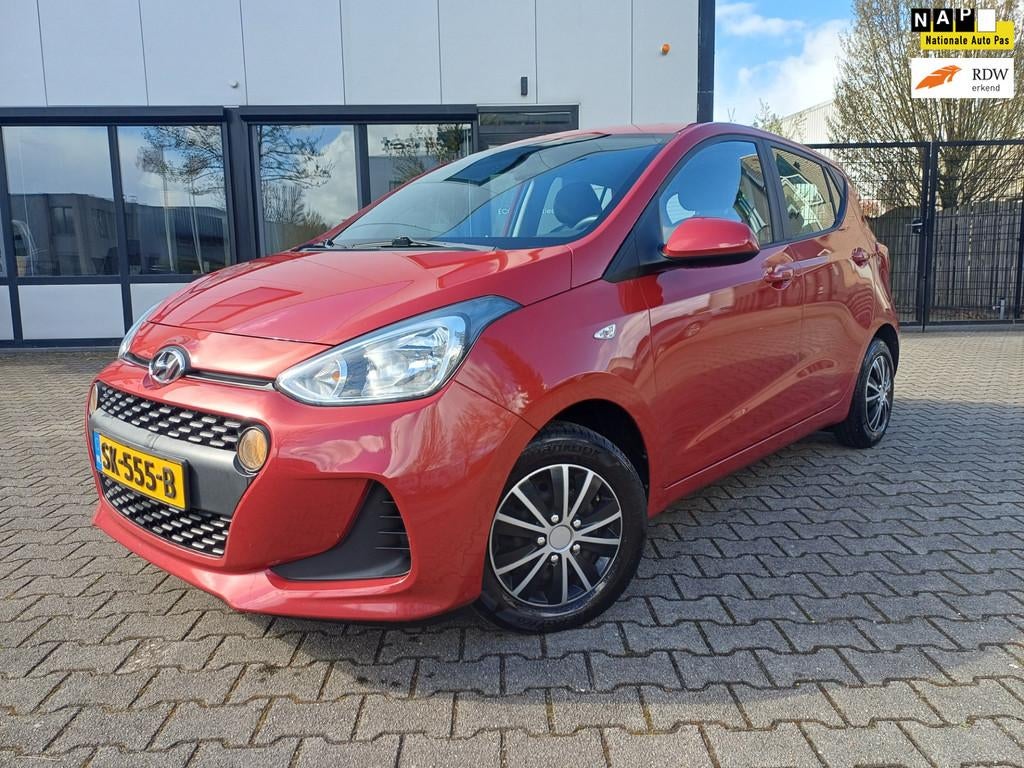 Hyundai I10 1.0i Comfort NAVI/PDC/AIRCO/CRUISE, Voorwielaandrijving, Stof, Gebruikt, 4 stoelen