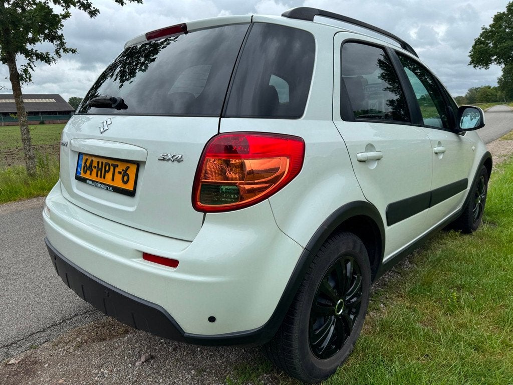Suzuki SX4 1.6 Shogun met airco, Gebruikt, Zwart, 4 cilinders, Origineel Nederlands