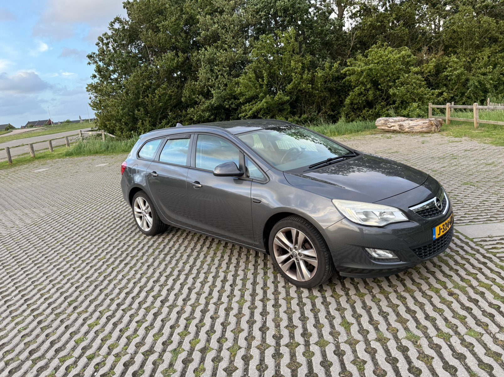 Opel Astra 1.4 Turbo 103KW 5D AUT 2012 Grijs, Auto's, Opel, Voorwielaandrijving, 4 cilinders, Handgeschakeld, Particulier