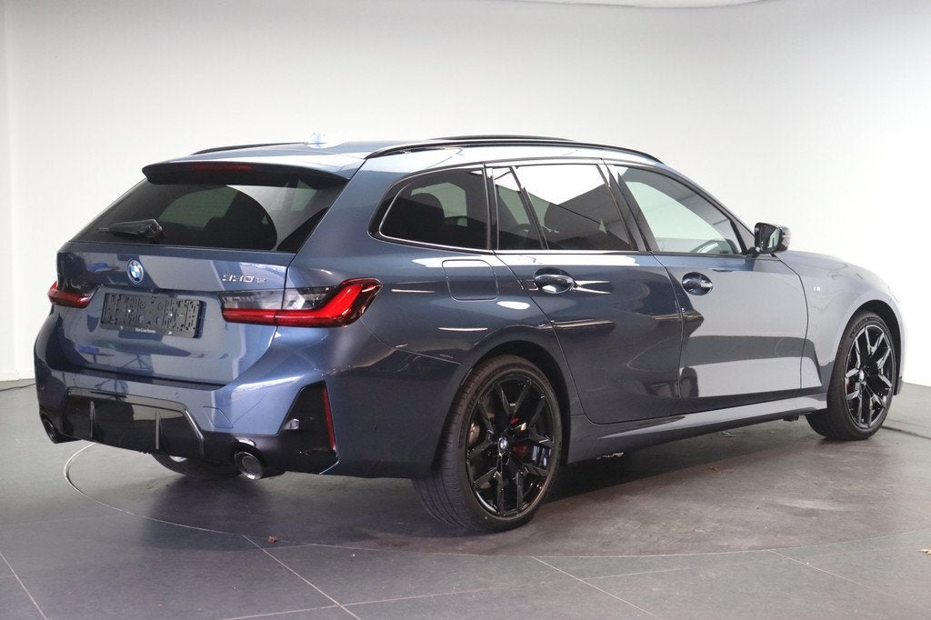 BMW 3 Serie Touring 330e M Sport Automaat / Panoramadak / Tr, Auto's, BMW, Automaat, 1998 cc, Achterwielaandrijving, Zwart