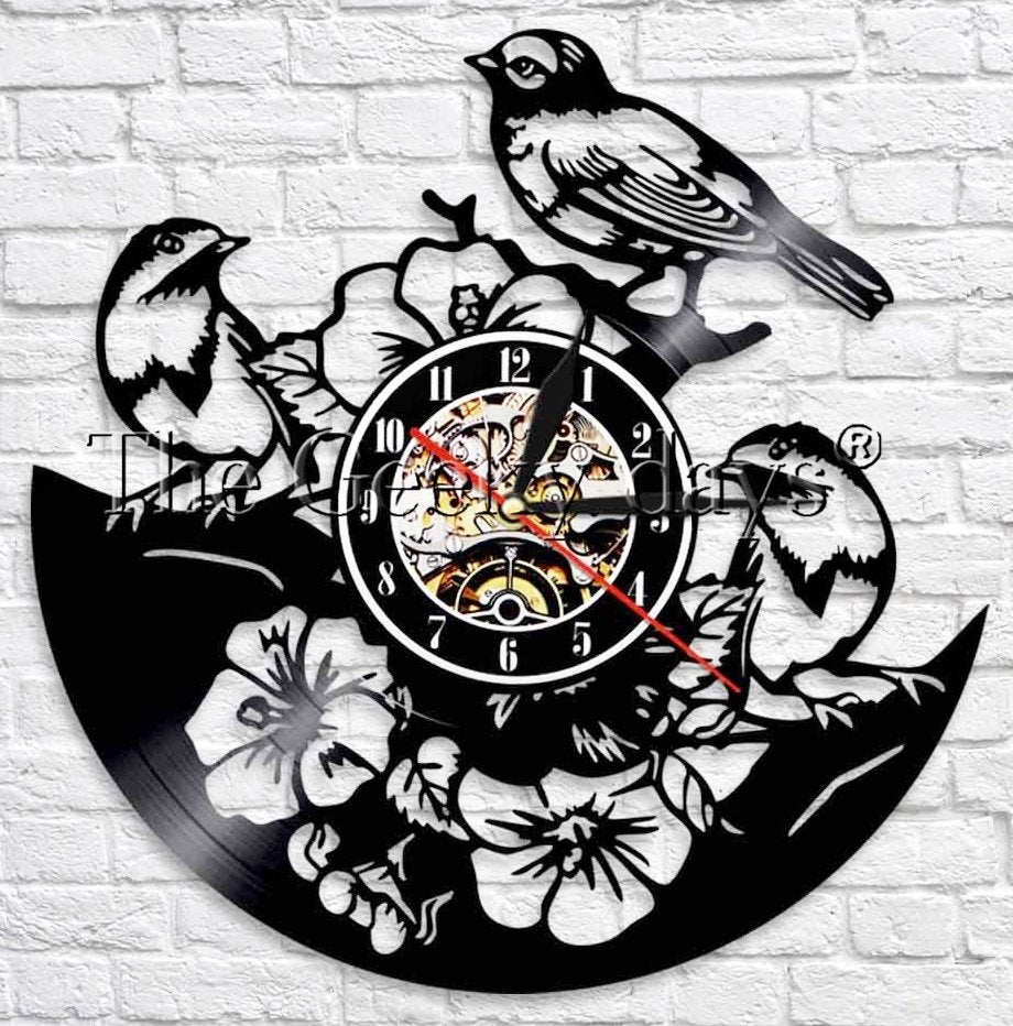 wandklok in vinyl / tuinvogels - nieuw in de doos, Ophalen of Verzenden, Nieuw, Werkt op batterijen, Wandklok
