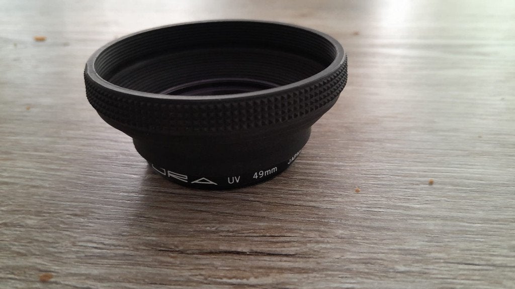 TORA 49mm UV filter met rubberen zonnekap, Ophalen of Verzenden, Minder dan 50 mm, UV-filter