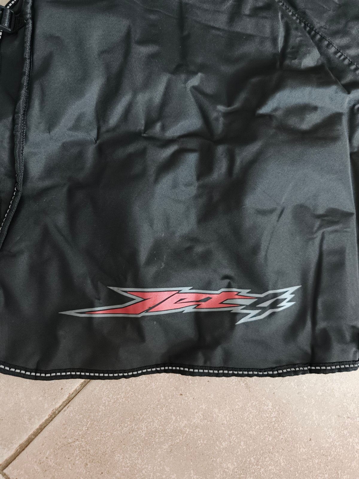Beenkleed voor scooter, Ophalen