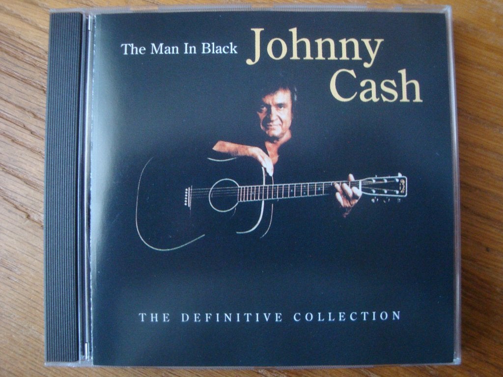 Johnny Cash - The Man In Black (24 tracks), Americana, Ophalen of Verzenden, Zo goed als nieuw, Inclusief boekje