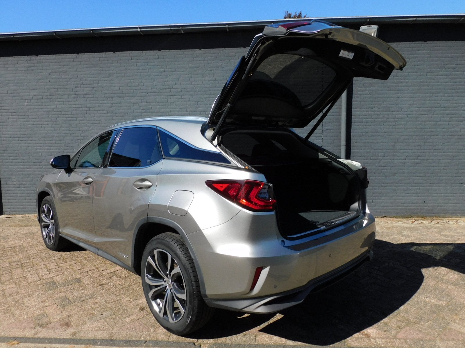 Lexus RX 450h 4WD Luxury Line TOPSTAAT! DEALER OND! STOELVER, Auto's, Automaat, Dealer onderhouden, Gebruikt, 2000 kg