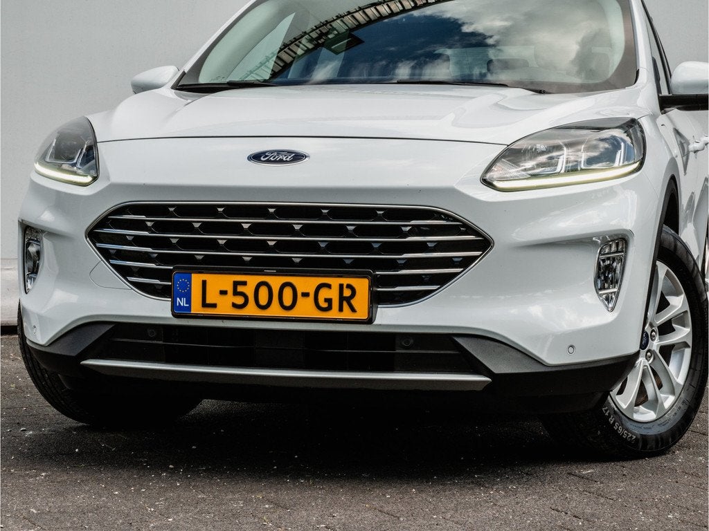 Ford Kuga 2.5 PHEV 225pk Titanium Full map navigatie/ Camera, Gebruikt, 4 cilinders, Met garantie (alle), Wit