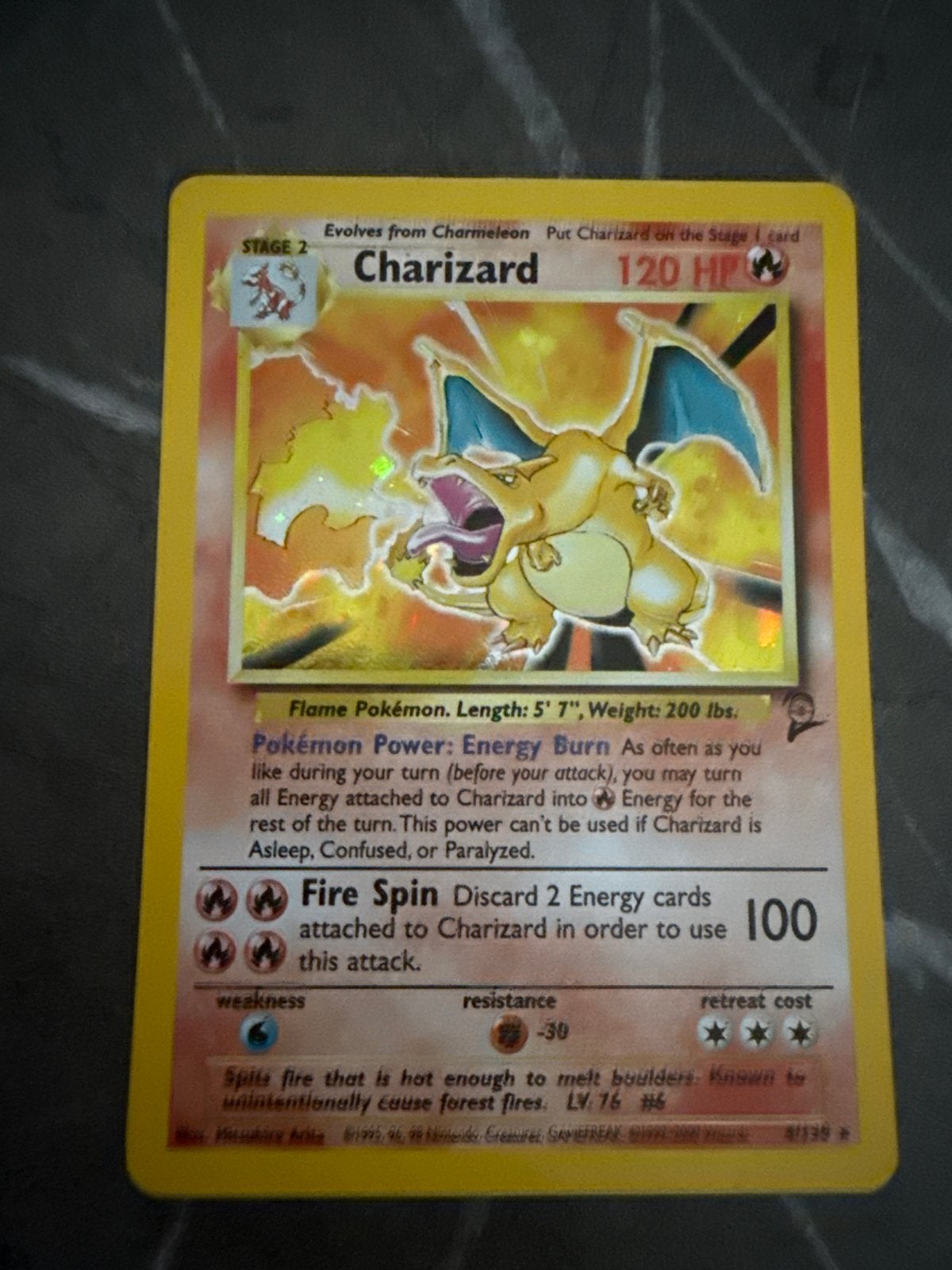 Charizard Pokémon kaart - Base Set Holo 4/130, Verzenden, Zo goed als nieuw, Losse kaart, Foil