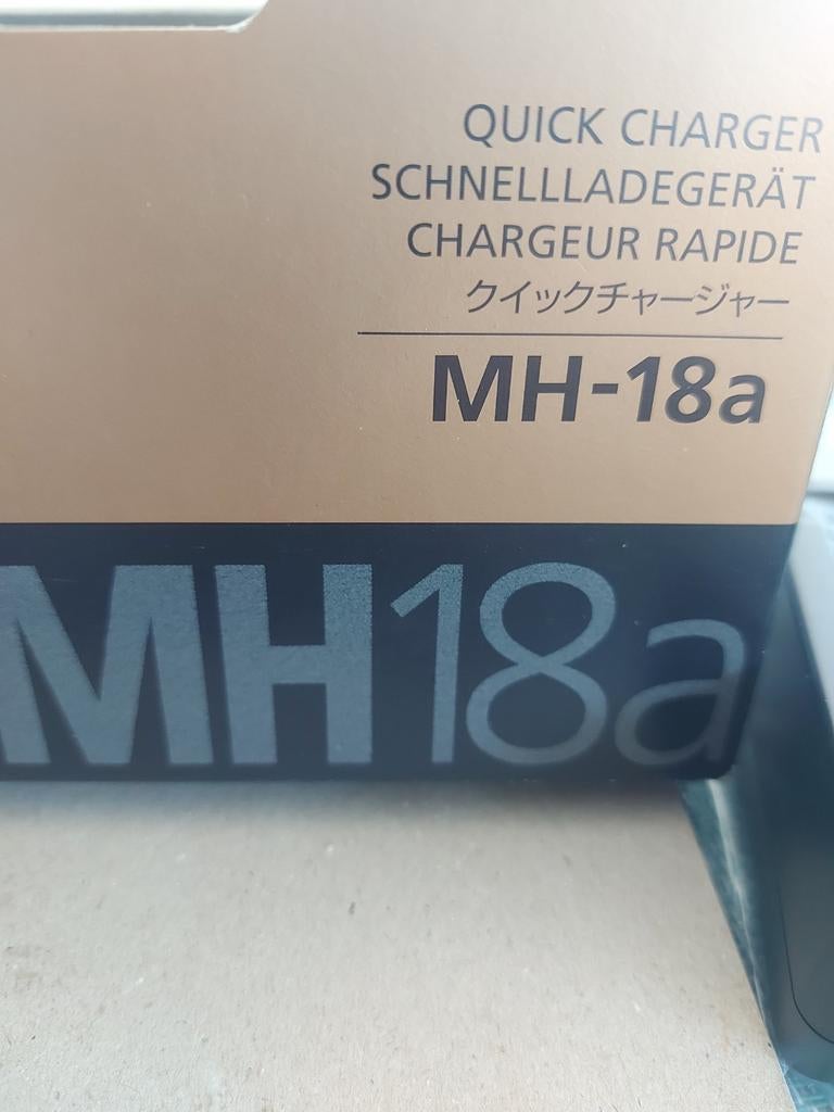 Oplader nikon, Ophalen