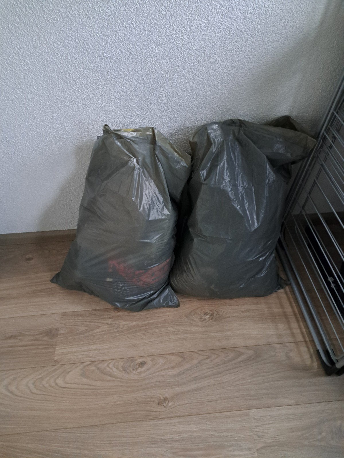 2 zakken dames- en herenkleding, diverse maten, Ophalen