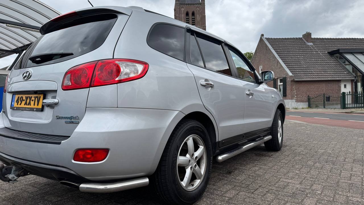Hyundai Santa Fe 2.7 2WD 7-ST 2007 Grijs, Auto's, Hyundai, Voorwielaandrijving, Santa Fe, 2000 kg, Handgeschakeld