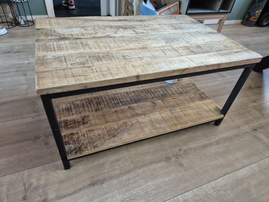 Mango salontafel, Ophalen