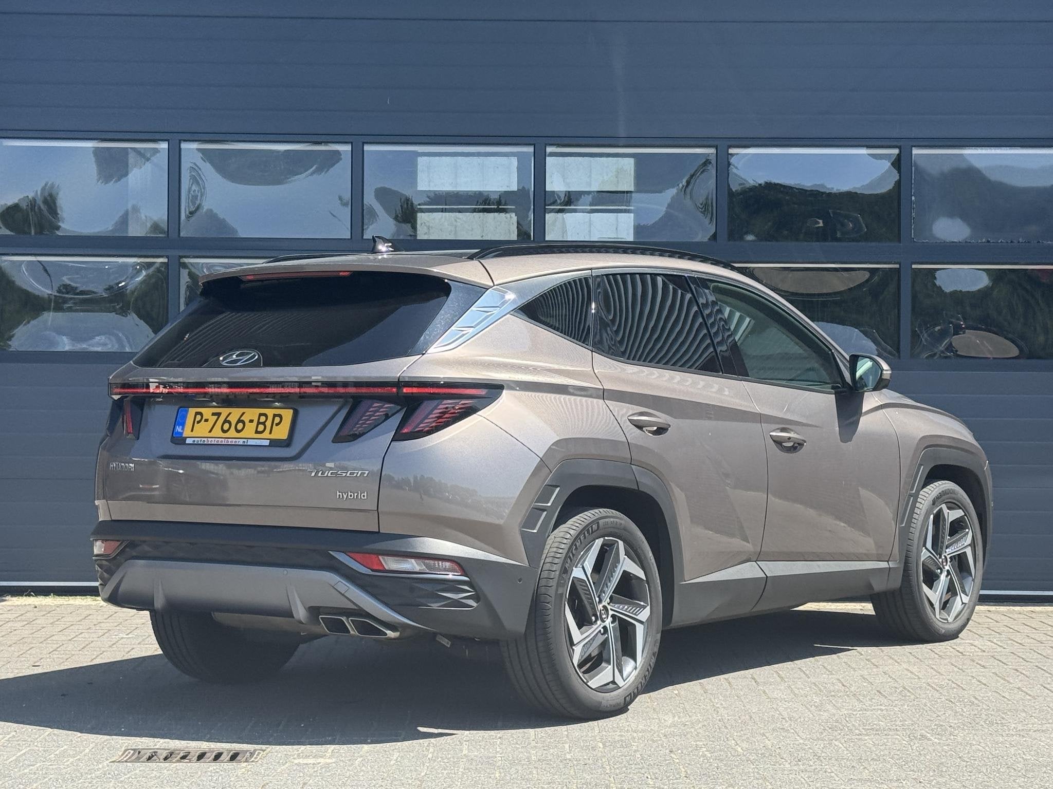 HYUNDAI TUCSON 1.6 T-GDI HEV PREMIUM SKY I SCHUIF/KANTELDAK, Auto's, Gebruikt, 4 cilinders, 1650 kg, Origineel Nederlands