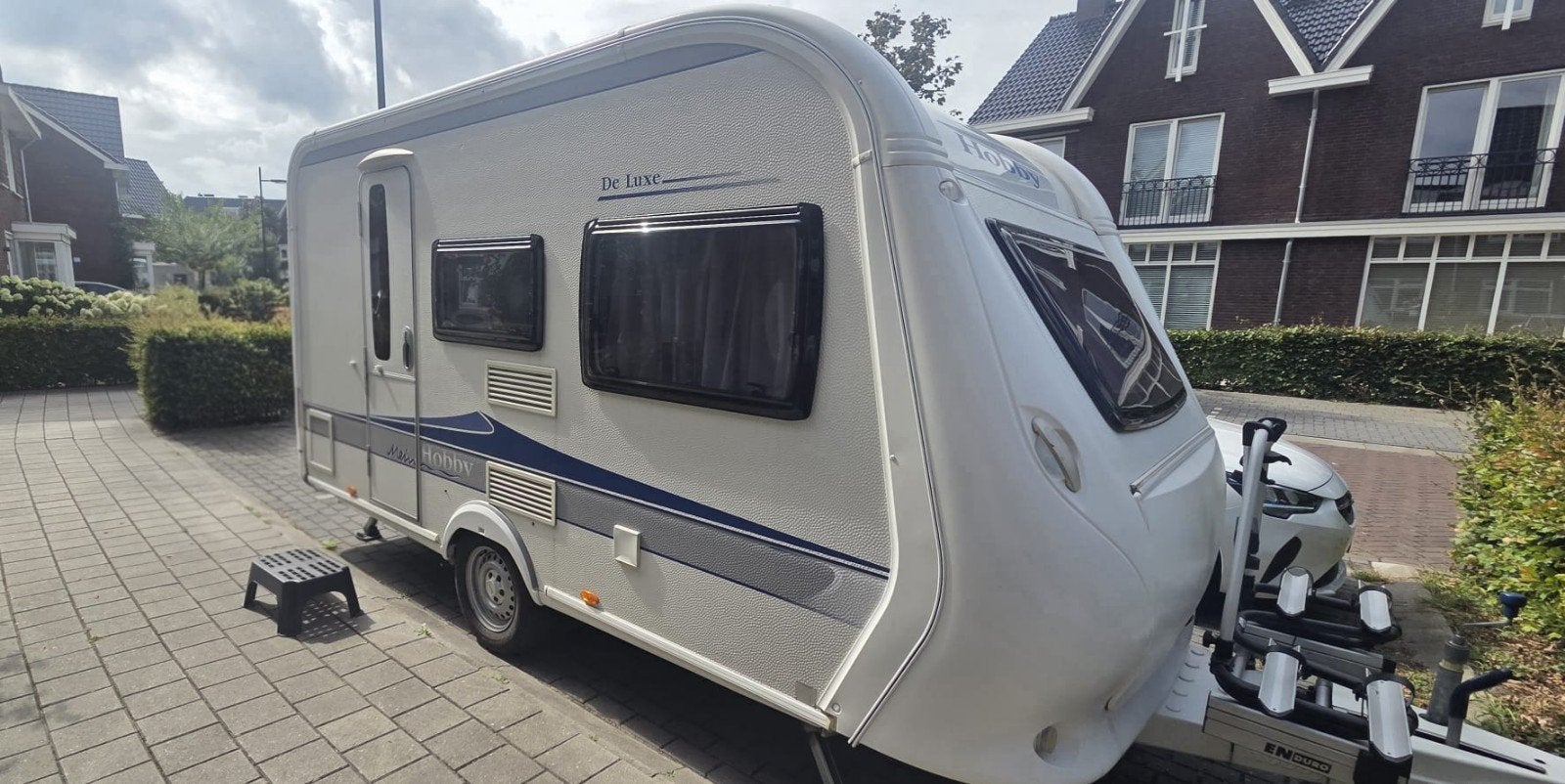 Hobby De Luxe 400 SF caravan met voortent te koop, Caravans en Kamperen, Hobby, Treinzit, Particulier, 4 tot 5 meter