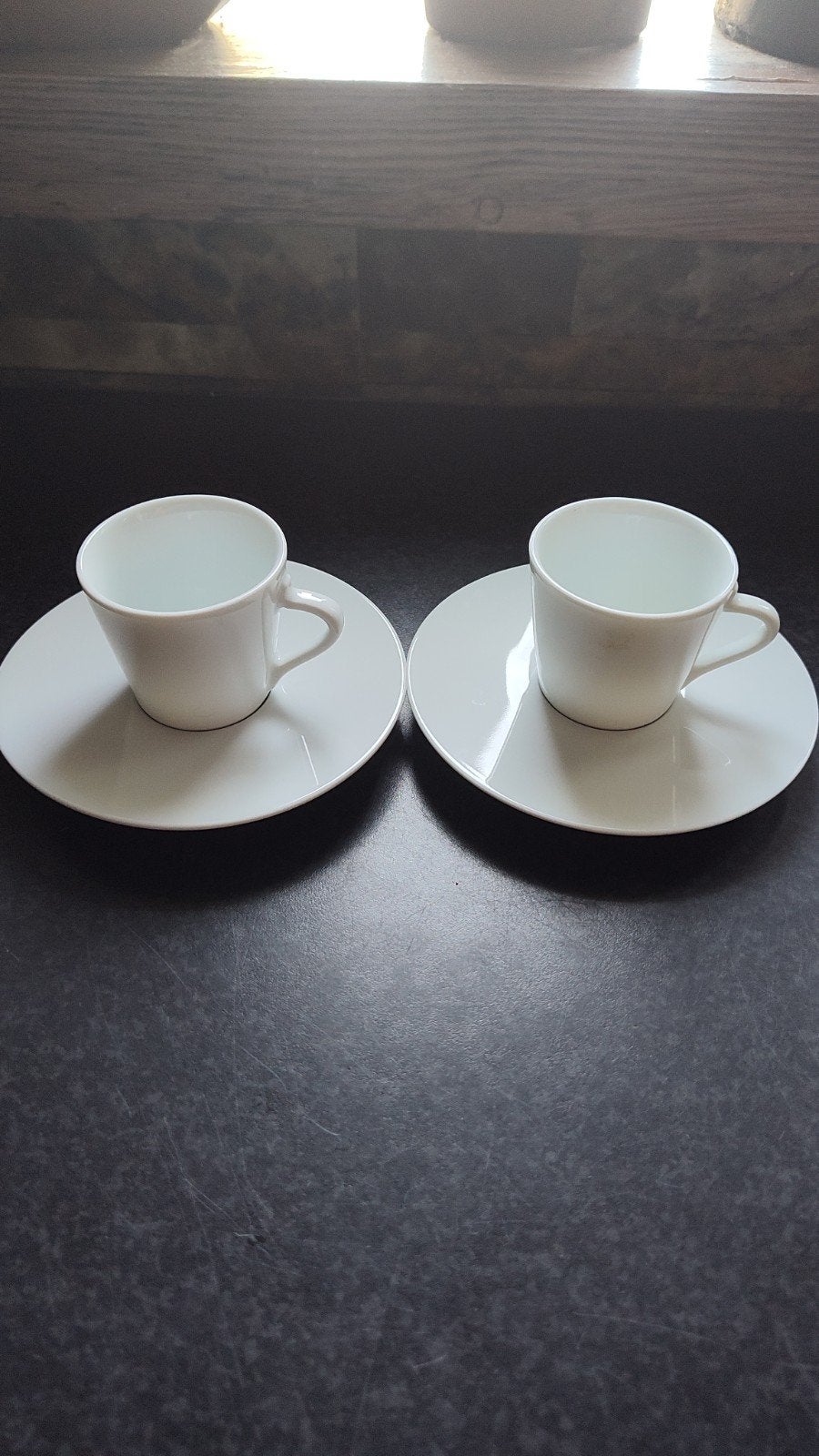 Setje van 2  Nespresso espresso kop en schotels, Ophalen of Verzenden, Overige stijlen, Kop(pen) en/of Schotel(s)