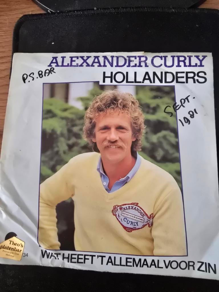 Alexander Curly - Hollanders, Fotohoes, Ophalen of Verzenden, Gebruikt, Nederlandstalig