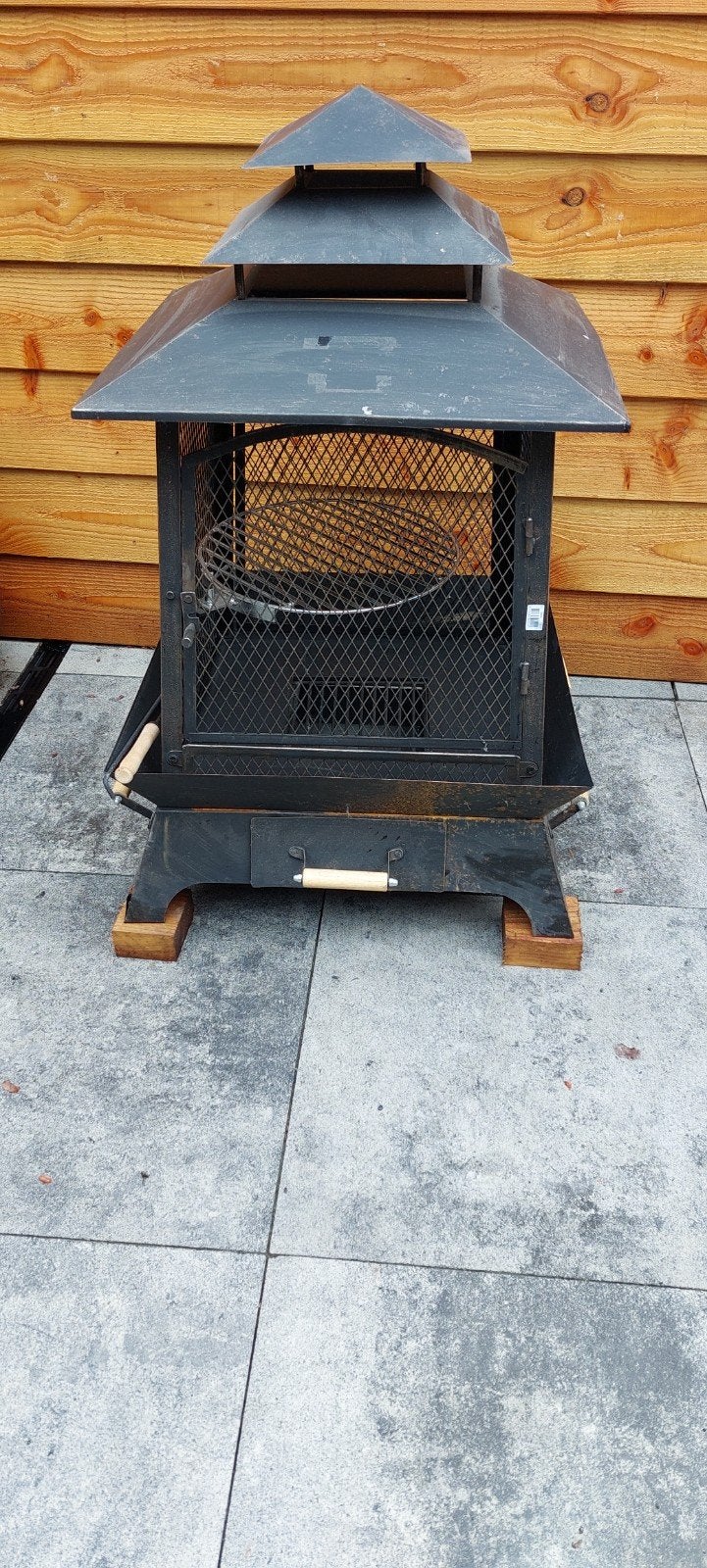 Buiten kachel ./bbq, Ophalen