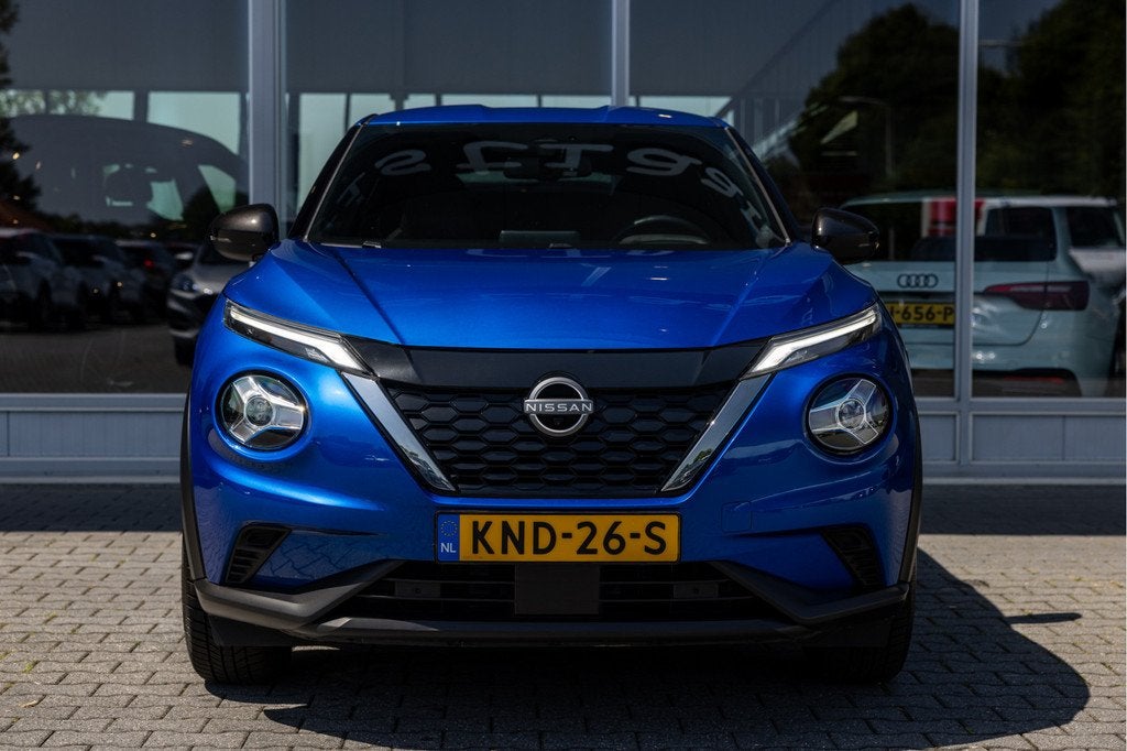 Nissan Juke 1.6 Hybrid Tekna | 360 Cam | Carplay | Adapt. Cr, Auto's, Nissan, 12 maanden, 1300 kg, Gebruikt, Blauw