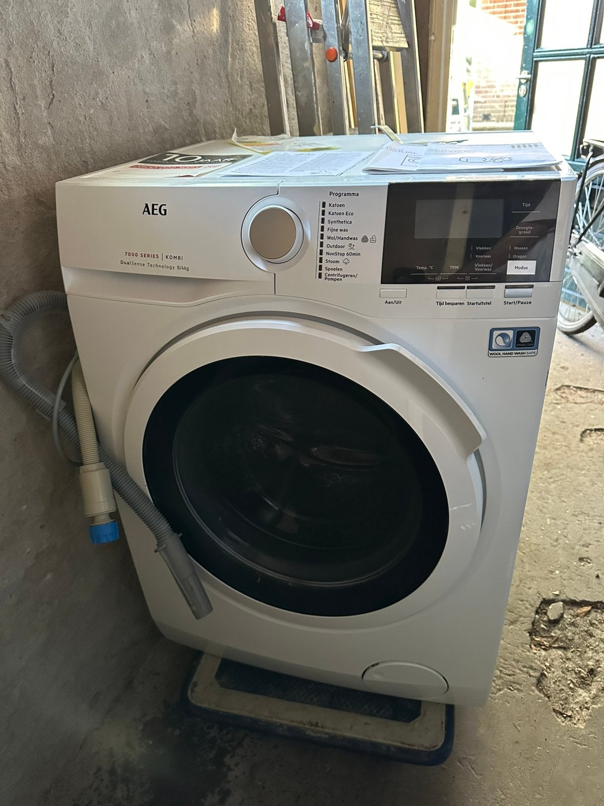 AEG L7WB86GW - wasmachine-droger combinatie  – 8/4 kg, 6 tot 8 kg, Ophalen, Zo goed als nieuw, 85 tot 90 cm