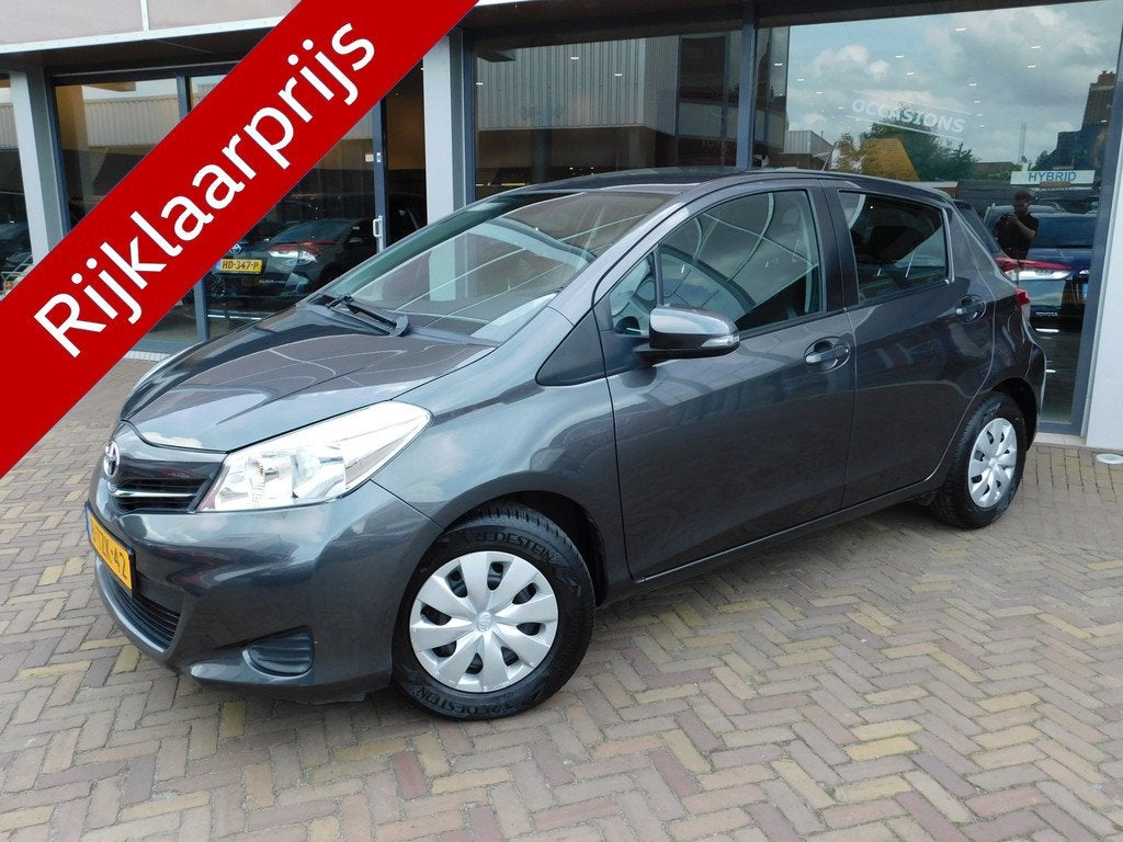 Toyota Yaris 1.0 VVT-i Now (bj 2014), Auto's, Stof, Gebruikt, Bedrijf, Handgeschakeld