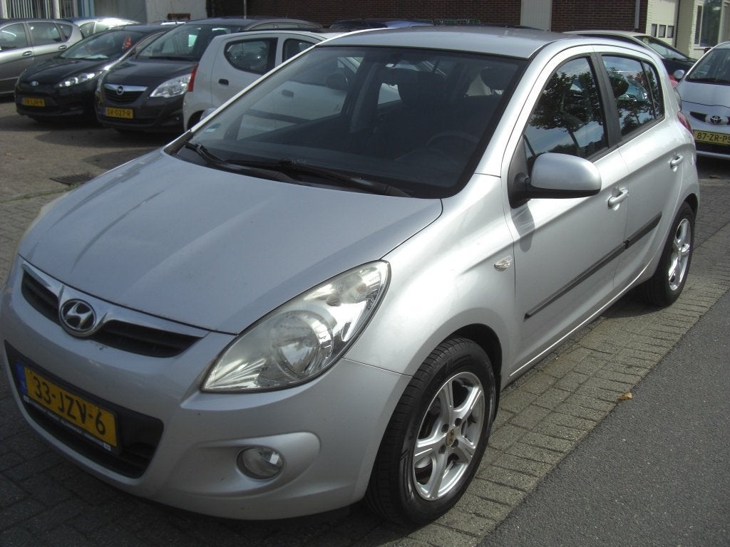 Hyundai i20 apk 11.26 1.2i Dynamic airco (bj 2009), Auto's, 945 kg, Dealer onderhouden, 450 kg, Gebruikt