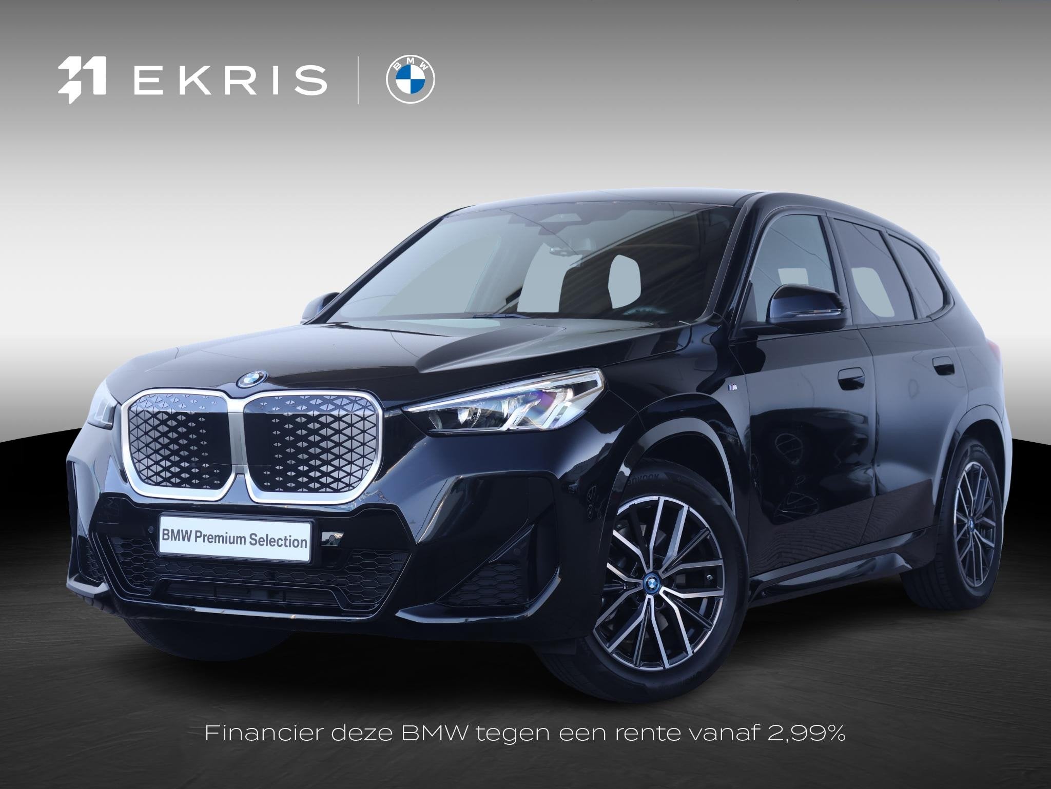 BMW iX1 xDrive30 67 kWh | SoH 100% | M-Sport Pakket | Achter, Auto's, Automaat, Stof, Zwart, Met garantie (alle)