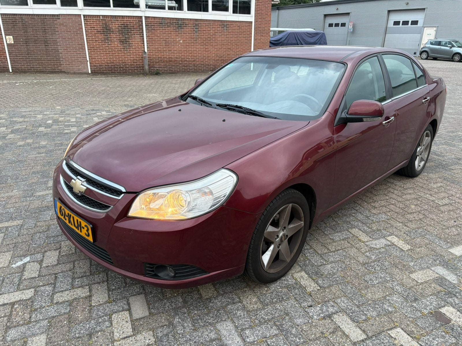 Chevrolet Epica 2.5 AUT 2010 Rood, Auto's, Chevrolet, Euro 5, 156 pk, Grijs, Particulier