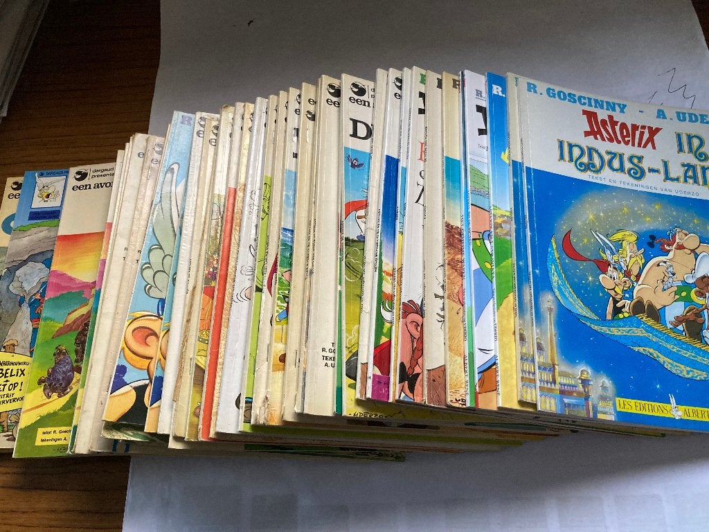 T.K. Nog 30 strips van Asterix en Obelix & 10 DVD zie lijst, Meerdere stripboeken, Ophalen of Verzenden, Gelezen